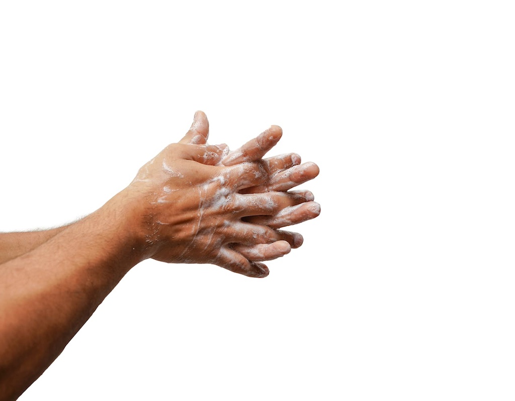 A person washing hands