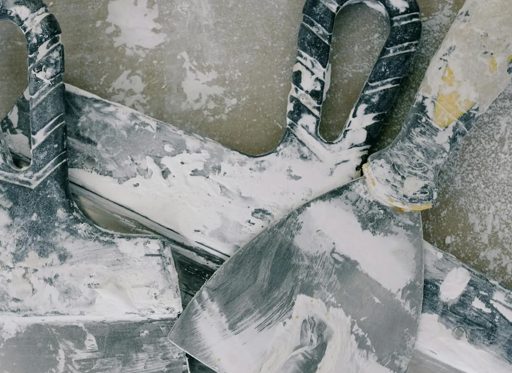 Dirty spatulas on floor