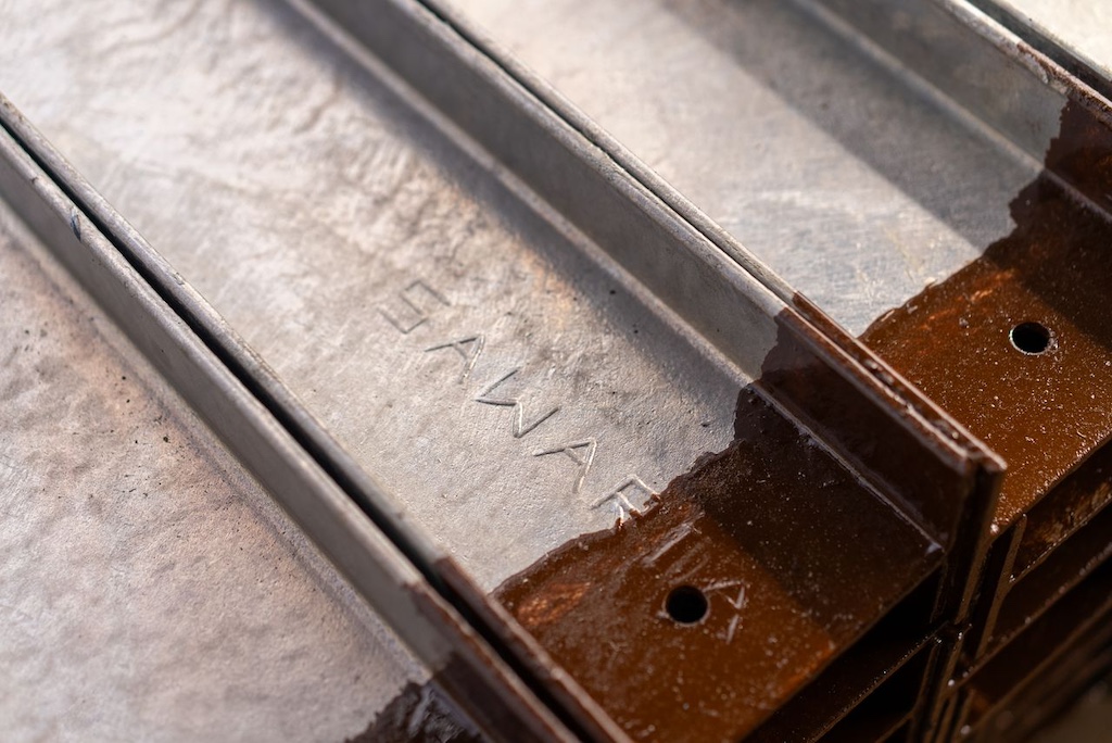 Close up of rusty metal rails in industrial setting